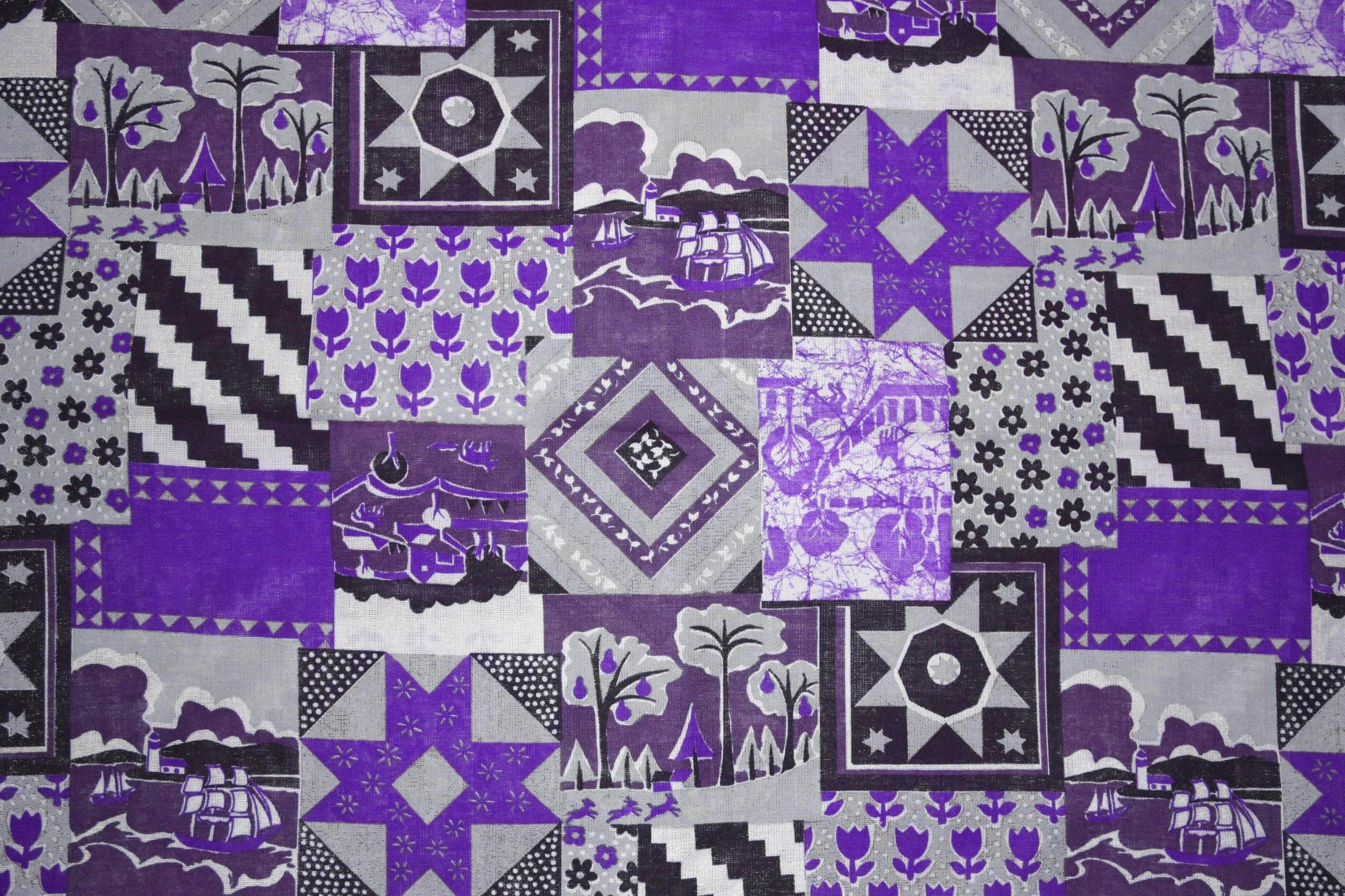 purple-patchwork-quilt-fabric-texture.webp