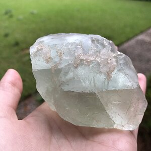 Fluorite crystal with small quartz crystals