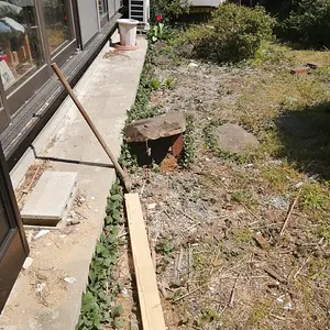 Levering a large rock.
