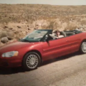 Gary driving a chrysler sebring convertible