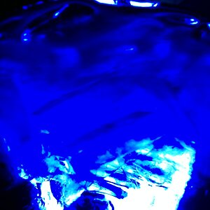 blue water glass in light affect