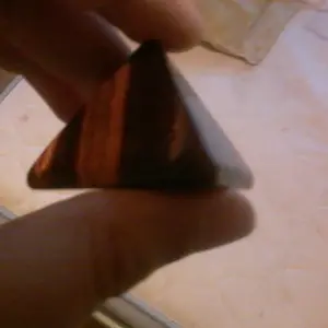 Red tiger's eye pyramid