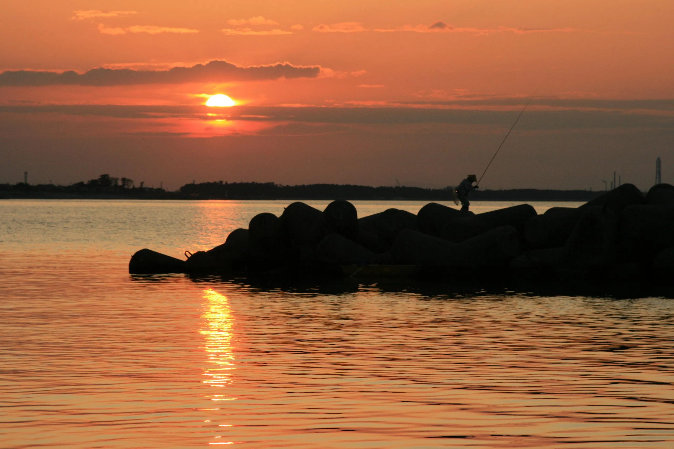 Fisherman by the sea by my house.