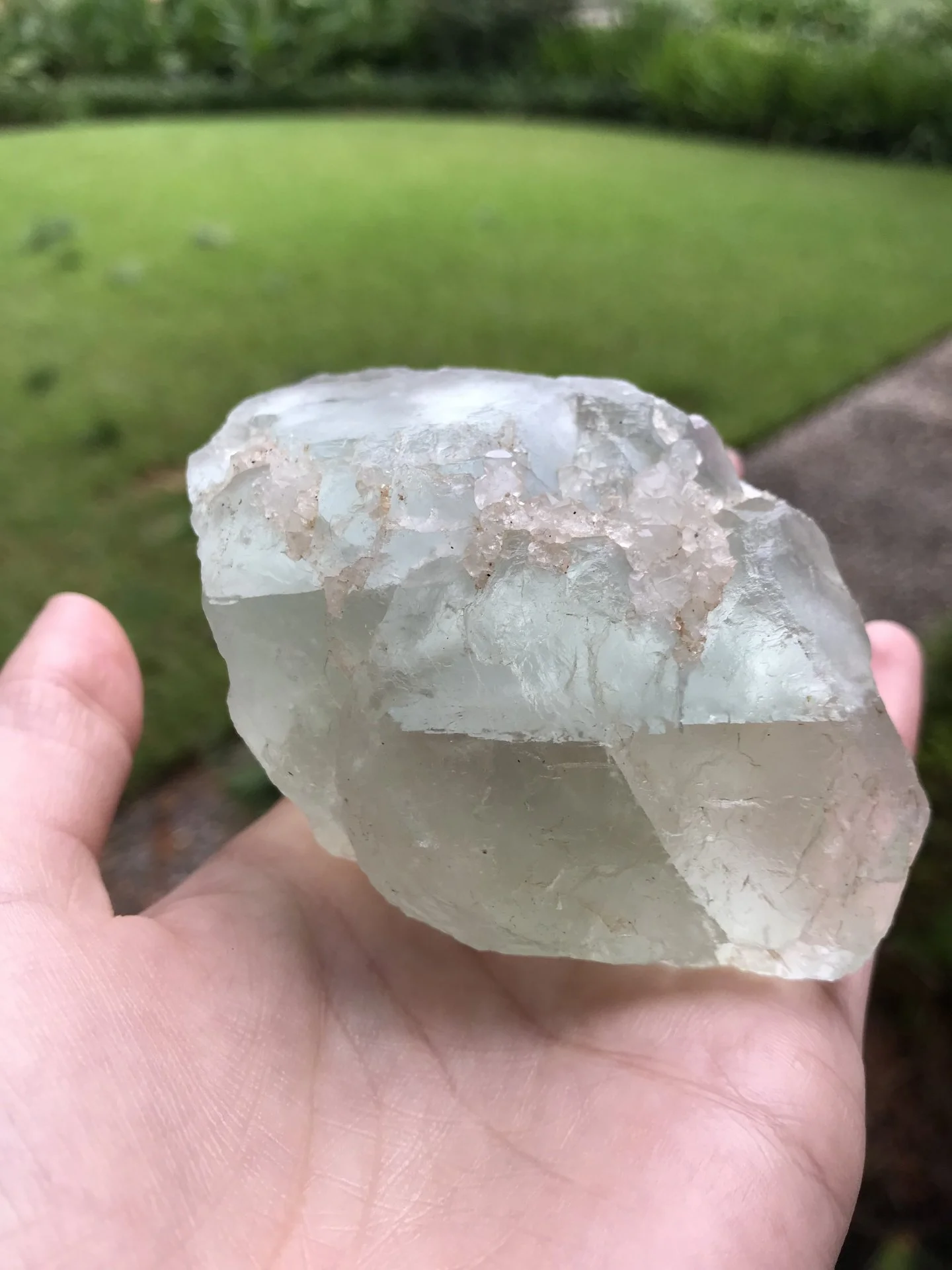 Fluorite crystal with small quartz crystals