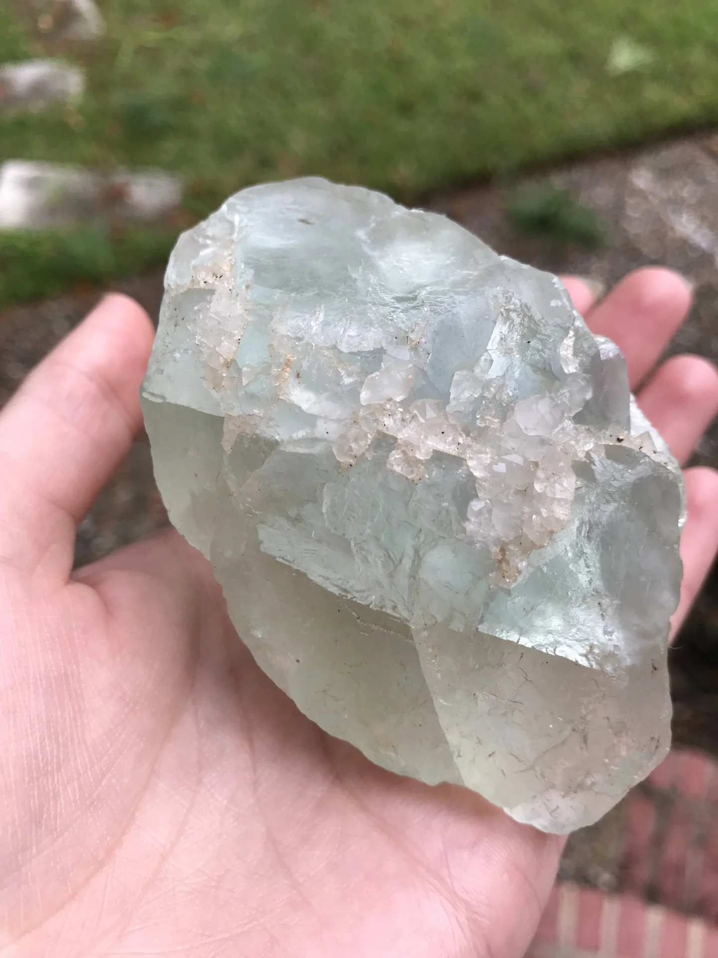 Fluorite crystal with small quartz crystals
