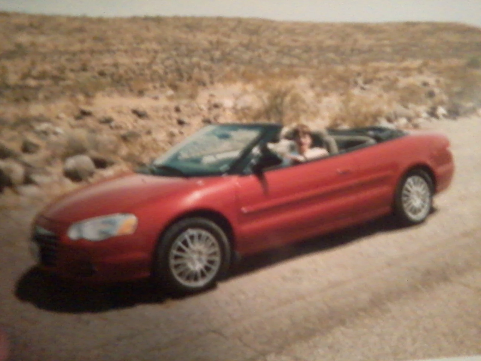 Gary driving a chrysler sebring convertible