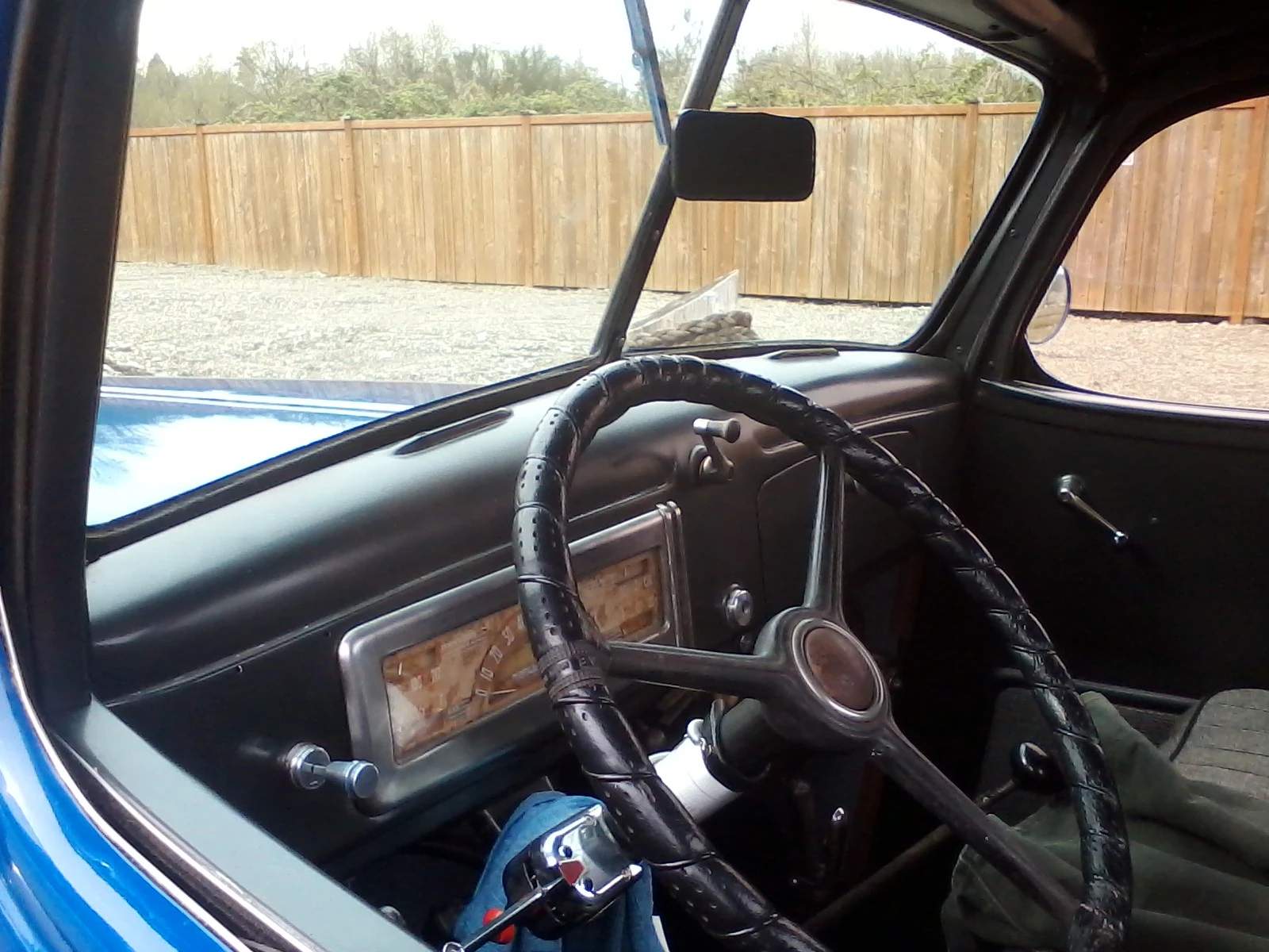 interior of the picture of the older blue truck