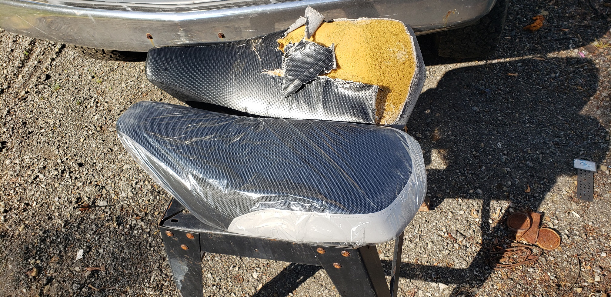 Junked out and replacement seat