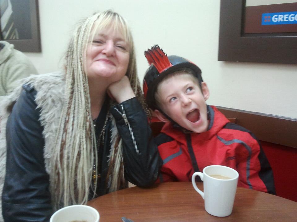 My Stepson with his Nanna Sioux and his new helmet on his birthday <3