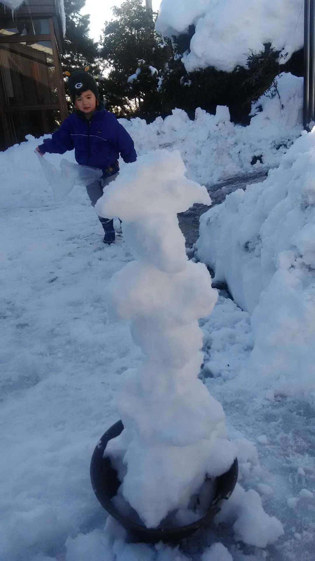 One of dude's first snowmen!