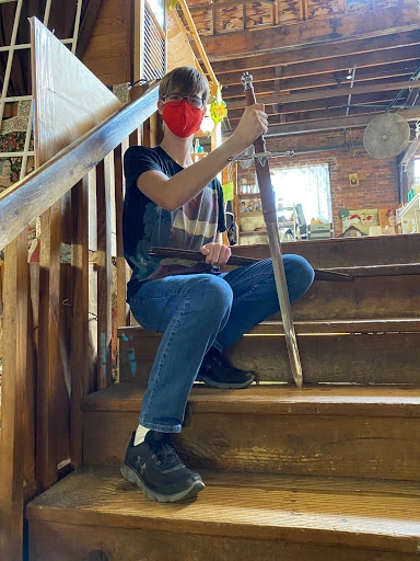 Posing on Steps With Cool Sword