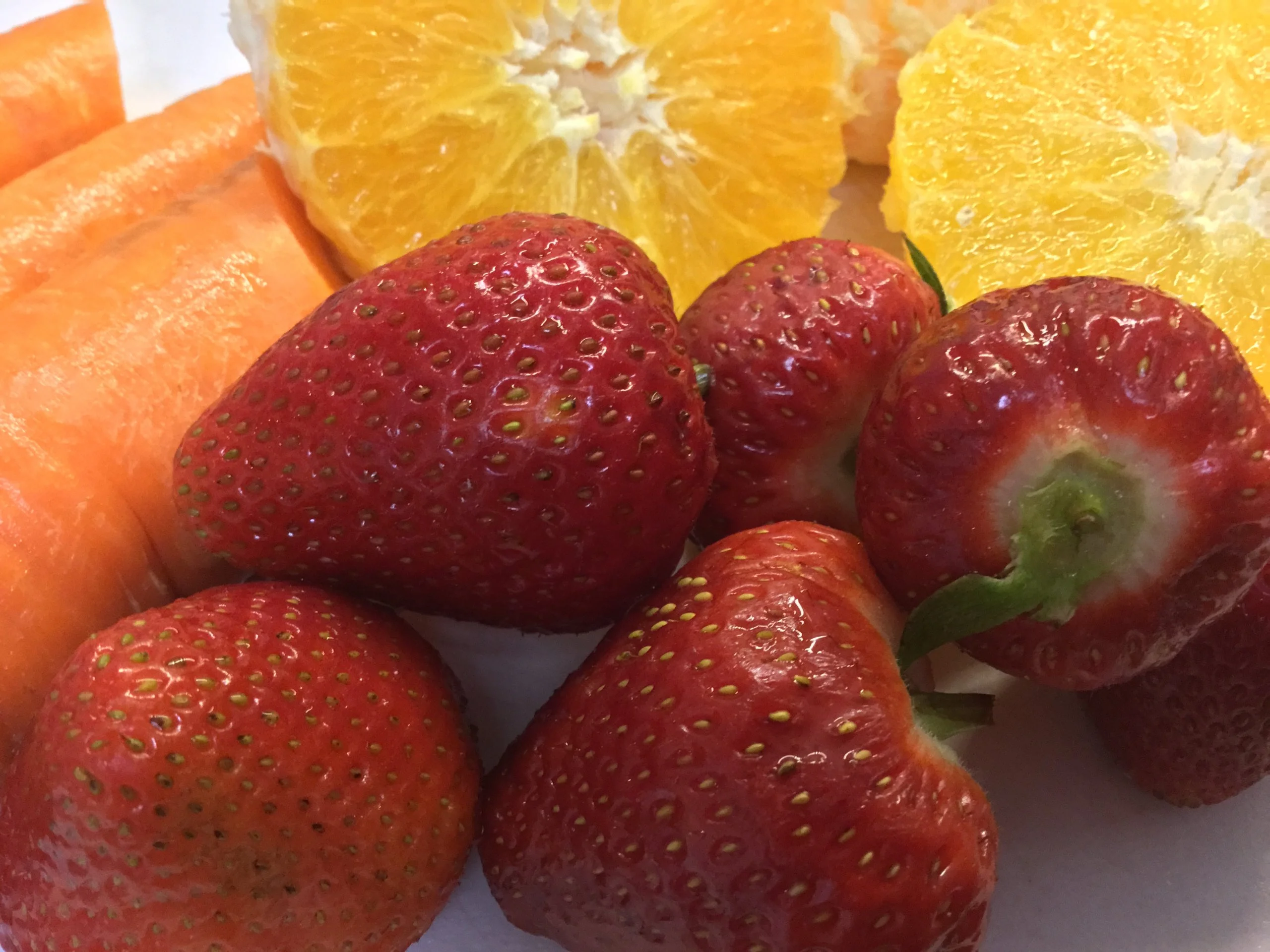 Strawberries oranges carrots, so beautiful