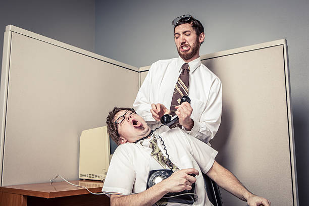 two-comical-nerdy-office-workers-fighting-with-phone.jpg