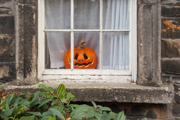 a-halloween-pumpkin-on-a-window-ledge.jpg