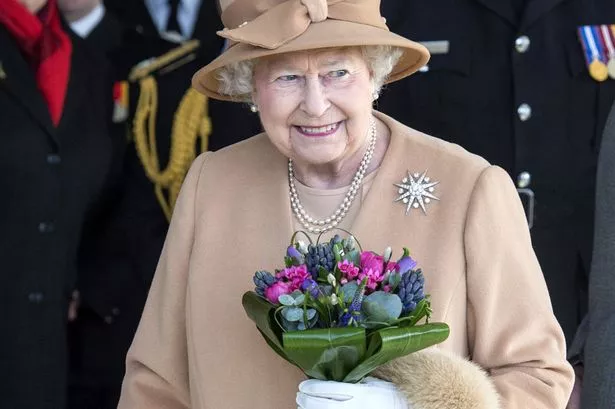 Britains-Queen-Elizabeth-II-visits-the-South-Lynn-Fire-Station.jpg