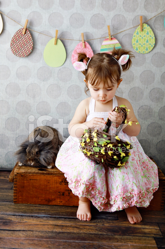 58216702-little-girl-with-easter-basket-and-bunny.jpg