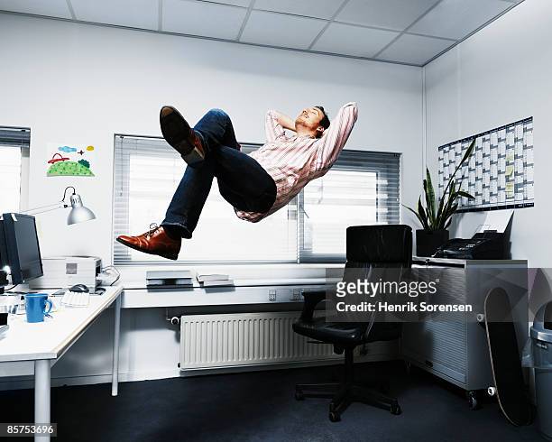 man-floating-in-his-office.jpg