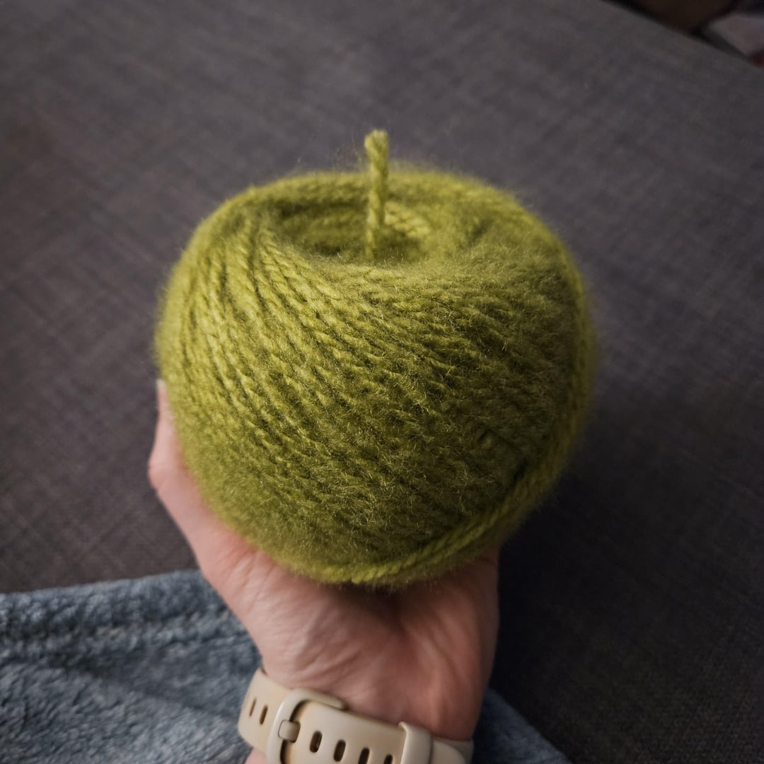 i-wrapped-this-green-apple-colored-yarn-into-a-yarn-cake-v0-oef7ur6z1spc1.jpeg
