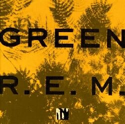 A golden yellow background with dark green impressions of leaves on it and the words GREEN and R.E.M. written on top in black