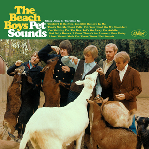The Beach Boys at the zoo feeding apples to goats. The header displays The Beach Boys Pet Sounds followed by the album's track list.