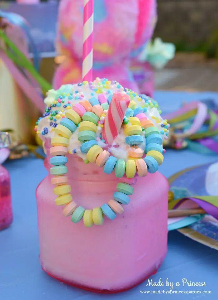 Cotton-Candy-Unicorn-Milkshake-Party-Food-Recipe-pink-candy-stick-with-candy-necklace.jpg.webp